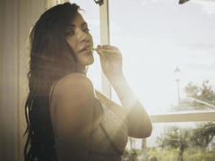 MeganErotic - female with black hair and  big tits webcam at xLoveCam