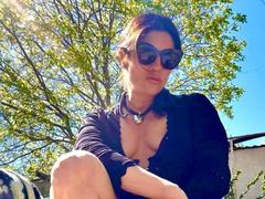MelPomena - female with brown hair and  big tits webcam at xLoveCam
