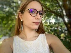 MiOneWallace - female with red hair and  small tits webcam at xLoveCam