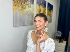 MiaAxel - female with brown hair webcam at xLoveCam