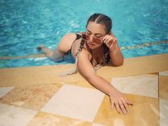 MiaWheel - female with brown hair and  big tits webcam at xLoveCam