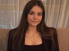 Litttlecat - female with brown hair and  big tits webcam at ImLive