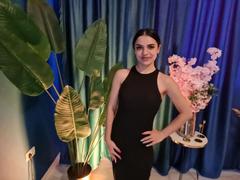 MiniMira - female with black hair and  small tits webcam at xLoveCam