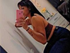 NellyRayn - female with brown hair and  big tits webcam at LiveJasmin