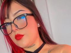 DomickArias - female with red hair and  small tits webcam at xLoveCam
