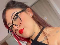 DomickArias - female with red hair and  small tits webcam at xLoveCam