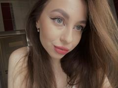 Murris - female with brown hair and  big tits webcam at xLoveCam