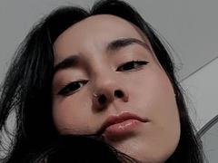 Derieri - female with black hair and  big tits webcam at xLoveCam