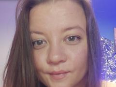 NessLulu - female with brown hair and  small tits webcam at xLoveCam