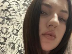 NollieNora - female with black hair and  small tits webcam at xLoveCam