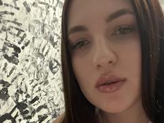 NollieNora - female with black hair and  small tits webcam at xLoveCam