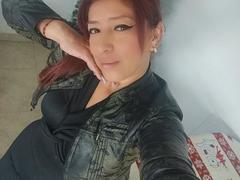 NorisLarson - female with red hair and  big tits webcam at LiveJasmin