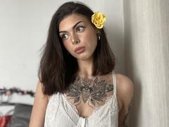 NovaSin - female with brown hair and  small tits webcam at xLoveCam