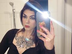 NovaSin - female with brown hair and  small tits webcam at xLoveCam