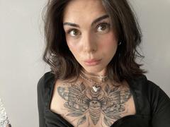 NovaSin - female with brown hair and  small tits webcam at xLoveCam