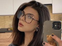 NovaSin - female with brown hair and  small tits webcam at xLoveCam