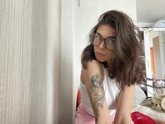 NovaSin - female with brown hair and  small tits webcam at xLoveCam