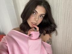 NovaSin - female with brown hair and  small tits webcam at xLoveCam