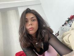 NovaSin - female with brown hair and  small tits webcam at xLoveCam