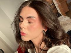 NovaSin - female with brown hair and  small tits webcam at xLoveCam