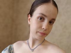 Olyanash - female with brown hair and  big tits webcam at xLoveCam