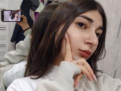 OnieAndreatta - female with black hair and  big tits webcam at xLoveCam