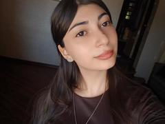 OnieAndreatta - female with black hair and  big tits webcam at xLoveCam