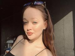 EstelaGallo - female with brown hair and  big tits webcam at LiveJasmin