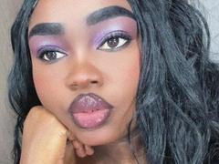 ReinaEbanox - female with black hair and  big tits webcam at xLoveCam