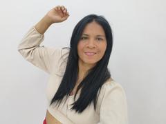 Rhouss - female with brown hair and  big tits webcam at xLoveCam
