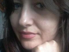 Riniya - female with brown hair and  small tits webcam at xLoveCam