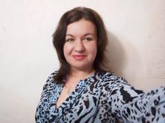 RitaSun - female with brown hair and  small tits webcam at xLoveCam