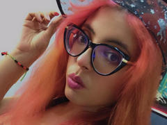 Rosalinnes - female with red hair and  big tits webcam at xLoveCam