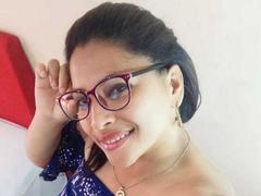 RoxaneMilf - female with black hair and  big tits webcam at xLoveCam