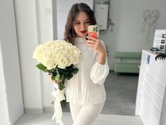 RozaSunn - female with brown hair and  big tits webcam at xLoveCam