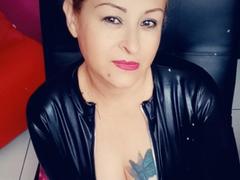 RubyHotMilf - female with red hair and  big tits webcam at ImLive