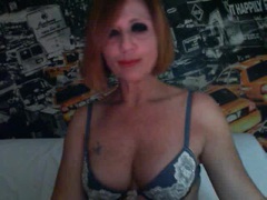 Scintilla - female with red hair webcam at xLoveCam