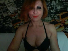 Scintilla - female with red hair webcam at xLoveCam
