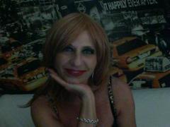 Scintilla - female with red hair webcam at xLoveCam