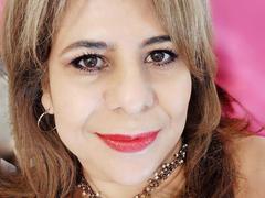SelenaMilf - female with brown hair and  big tits webcam at xLoveCam