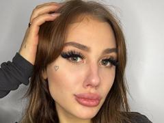 SensualMila - female with brown hair and  small tits webcam at xLoveCam