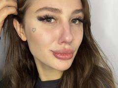 SensualMila - female with brown hair and  small tits webcam at xLoveCam