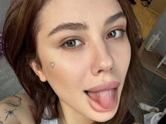 SensualMila - female with brown hair and  small tits webcam at xLoveCam