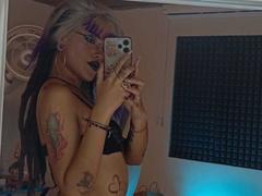 SharlotteX - female with brown hair and  small tits webcam at xLoveCam
