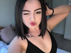 SinfulKitty - female with black hair and  big tits webcam at xLoveCam