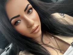 SmileAndrea - female with brown hair and  big tits webcam at xLoveCam