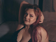 StellaSunfield - female with red hair and  big tits webcam at xLoveCam