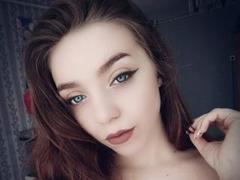 SugarrX - female with brown hair and  small tits webcam at xLoveCam