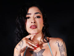 SukiHollins - female with black hair and  big tits webcam at LiveJasmin