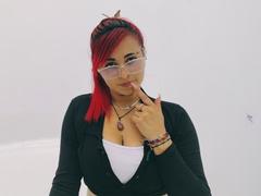 Sushy - female with red hair and  big tits webcam at xLoveCam